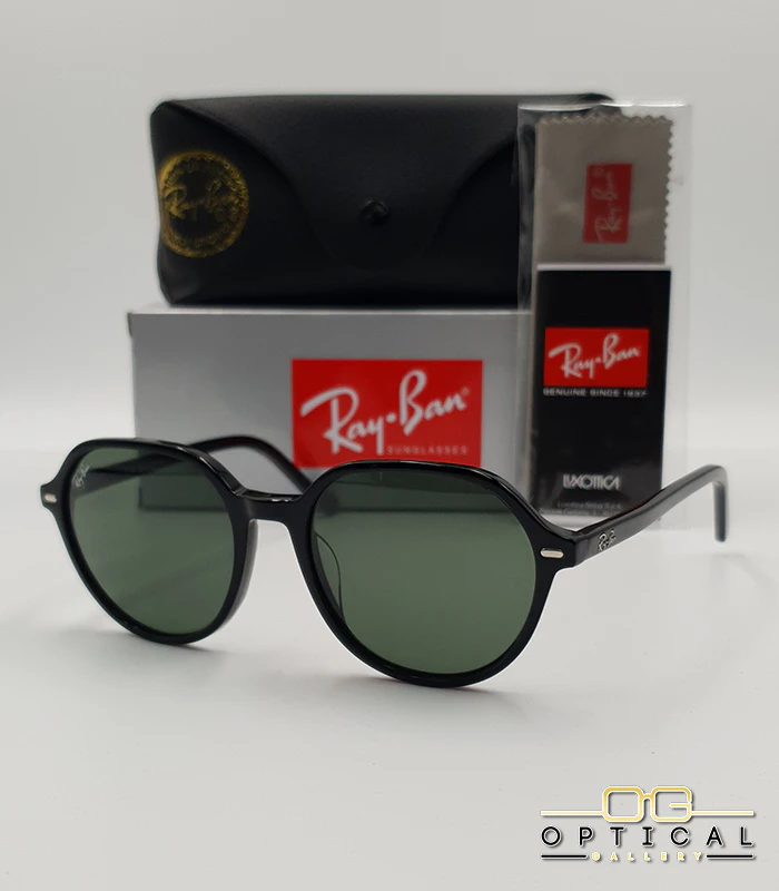 Lunettes de soleil Ray-Ban RB2195 Thalia - Noir / Vert G-15 Lunettes de soleil Ray-Ban RB2195 Thalia monture noire verres verts G-15 avec étui et boîte d'origine.