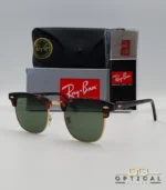 Lunettes de soleil Ray-Ban Clubmaster RB3016 monture écaille de tortue et métal doré avec verres verts G-15, étui et boîte d'origine.